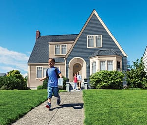 Young Boy Running Off To School