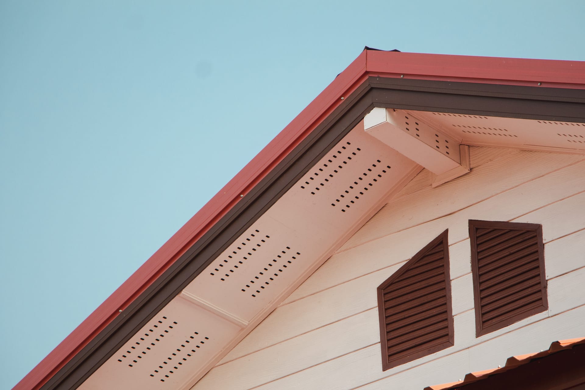 House roof and ceiling,with blue sky,   ventilation on a house. House roof and ceiling,with blue sky,   ventilation on a house.