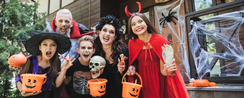 These trick or treaters are safe because they followed these Halloween safety tips