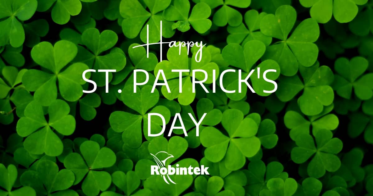 Happy St Patricks Day from Robintek text over clovers