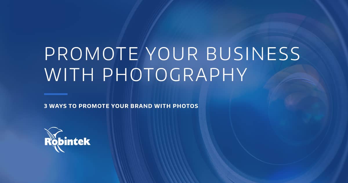 closeup of camera lens with text "promote your business with photography"