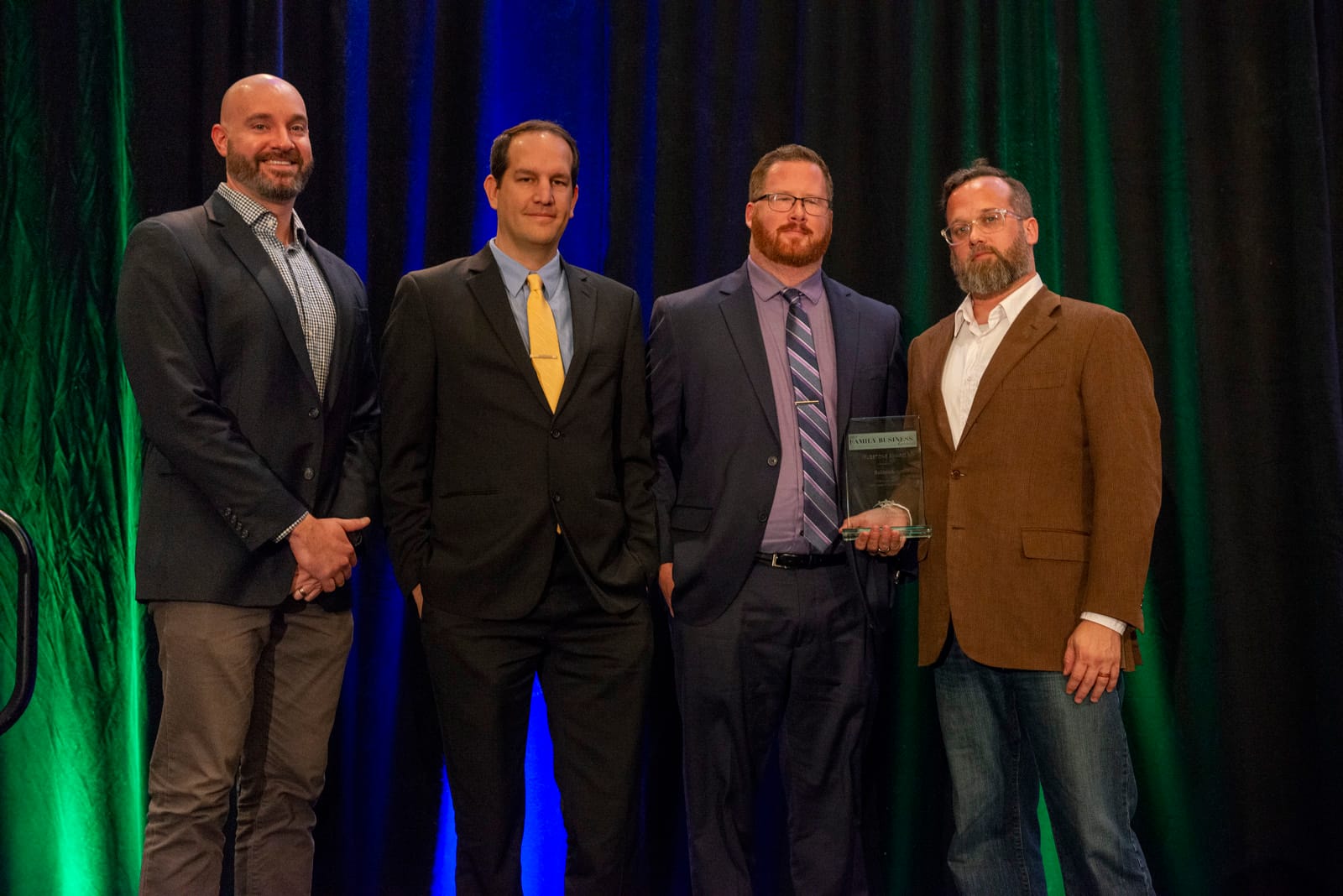 Robintek team accepts their milestone award at the Conway Center For Family Business Awards 2023