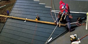 A GAF Certified roofer installing metal roofing