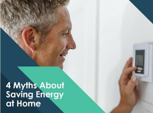 a man turns down his home's thermostat with 4 Myths About Saving Energy at Home in mind