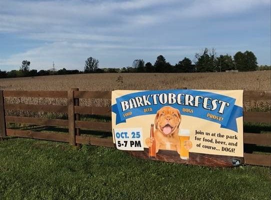 Metro Parks Barktoberfest sign on fence