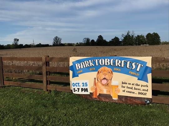 Metro Parks Barktoberfest sign on fence