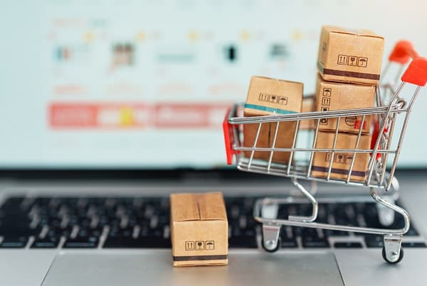 ecommerce web design with robintek shopping cart on computer keyboard