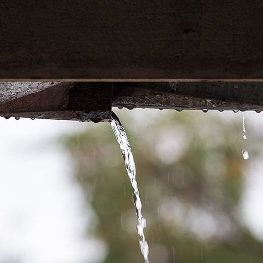 Broken Gutter After Storm