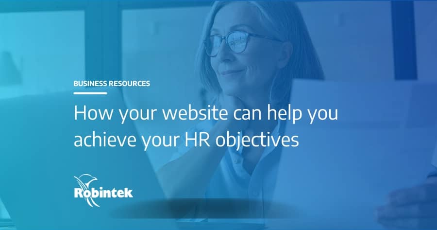 HR manager looking at computer with text overlay "How your website can help you achieve your HR objectives"